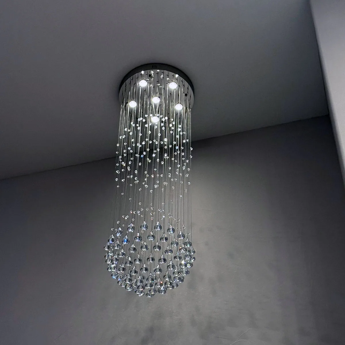 Elegant modern chandelier with LED lighting symbolizing safe electrical installation after professional fuse service Sacramento.